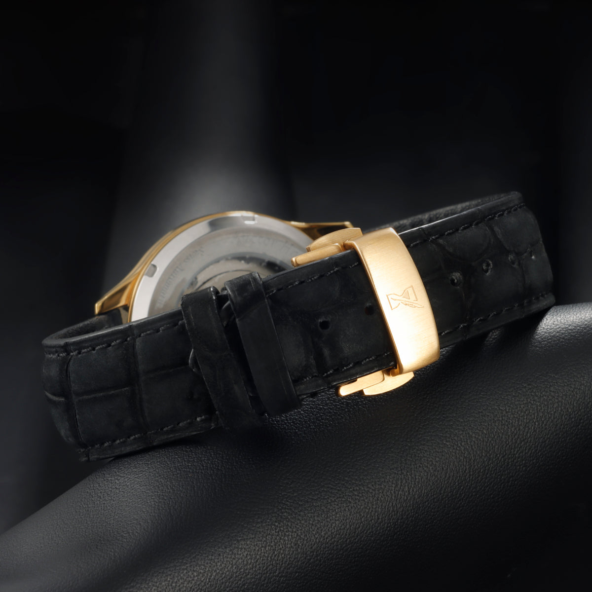 Auctor Zen butterfly deployment clasp in PVD gold finish on nubuck alligator strap